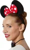 A woman wearing a Minnie Mouse costume accessory. Produktbild-Vorschau