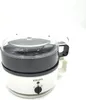 A white and black Krups egg cooker with a clear lid is shown against a white background. Voir les images du produit