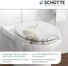 A toilet seat with a decorative design is shown on a toilet in a bathroom setting. Náhled obrázku produktu