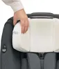 A hand is shown adjusting a white foam insert on a car seat. Produktbild-Vorschau