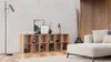 A modern living room with a wooden cube shelf, a sofa, and a floor lamp. Produktbild-Vorschau