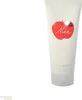 A tube of Nina Ricci Nina body lotion is shown against a white background. The tube is white with a red apple logo and text. Náhľad obrázku produktu