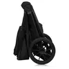 A black stroller is shown from the side, folded. Produktbild-Vorschau