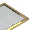 Close-up view of a gold-framed glass surface, likely a table or tray. Podgląd zdjęcia produktu