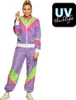 A woman is modeling a retro-style tracksuit. Produktbild-Vorschau