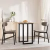 A dining set with a table and two chairs in a room with a cabinet and curtains. Anteprima dell’immagine prodotto