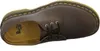 A top-down view of a brown leather Dr. Martens shoe on a white background. Anteprima dell’immagine prodotto