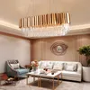A luxurious living room with a chandelier, sofa, armchair, and coffee table. Produktbild-Vorschau