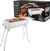 A stainless steel charcoal grill with food on it, shown next to its packaging. Produktbild-Vorschau