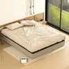 A bedroom scene with a bed, bedside table, and a large window overlooking a green landscape. Voir les images du produit