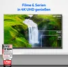 A television screen displaying a waterfall scene with resolution comparisons, accompanied by marketing badges and text. Produktbild-Vorschau