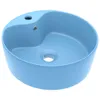 A light blue ceramic sink with a drain and faucet hole. Produktbild-Vorschau