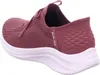 A side view of a red Skechers slip-on shoe with a white sole. Voir les images du produit