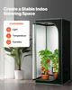 A grow tent with tomato plants inside, next to a large potted plant. Text overlays describe controllable features. Náhľad obrázku produktu