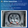 Close-up of an electric vehicle charging port with explanatory text in German. Produktbild-Vorschau