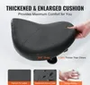 A close-up studio shot of a black bicycle seat with text overlays highlighting its features. Produktbild-Vorschau