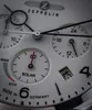 A close-up view of a Zeppelin chronograph watch face, showing the subdials, hands, and date window. Produktbild-Vorschau