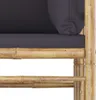 Close-up of a bamboo sofa frame with a dark gray cushion. Produktbild-Vorschau