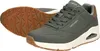 A pair of olive green Skechers Uno sneakers are shown from a diagonal angle against a white background. One shoe is shown from the side, highlighting the sole and air bubble, while the other shoe is shown from the bottom, revealing its tread pattern. Voir les images du produit