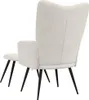 Rear view of a cream-colored armchair and ottoman with black legs, set against a white background. Náhled obrázku produktu