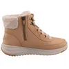 A side view of a brown Skechers boot with a white fuzzy lining. Voir les images du produit