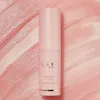 A pink Kahi Wrinkle Bounce Multi Balm stick is centered on a textured pink background. Náhled obrázku produktu