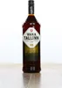 A bottle of Vana Tallinn liqueur is displayed upright on a wooden surface against a white background. Produktbild-Vorschau