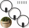 Three black metal rings for holding flower pots, mounted on a white background. A small inset image shows one ring holding a pot. Náhľad obrázku produktu