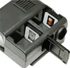 A close-up view of a Kaiser Diascop 50 N slide projector, showing the slide trays and a partially open compartment. Podgląd zdjęcia produktu