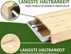 A close-up view of a bamboo cutting board with an integrated stainless steel tray, highlighting its features. Produktbild-Vorschau