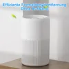 A white air purifier sits on a wooden surface against a light gray and white background. Produktbild-Vorschau
