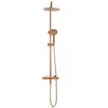 A rose gold shower set with a rain shower head and a handheld shower. Produktbild-Vorschau