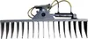 A heavy-duty hydraulic rake attachment for a mini excavator, shown against a white background. Produktbild-Vorschau