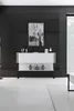 A modern white sideboard with black legs against a black slatted wall, with a piece of abstract art above it. Anteprima dell’immagine prodotto