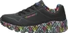A side view of a single black sneaker with colorful heart designs on the sole and collar. Voir les images du produit