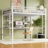 A white metal loft bed with an integrated desk and shelves, set up in a room with green walls and a patterned rug. Produktbild-Vorschau
