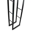 A close-up view of the bottom section of a black metal firewood rack. Produktbild-Vorschau