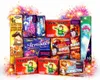 A collection of fireworks packaged in colorful boxes, arranged in a pile. Produktbild-Vorschau