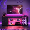 A modern entertainment center with a TV and gaming equipment, illuminated by RGB LED lights. Anteprima dell’immagine prodotto