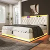A modern bedroom with a white upholstered bed frame featuring LED lighting. Produktbild-Vorschau