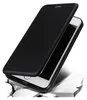 A black flip-style phone case is shown at an angle, partially open, revealing the phone screen inside. The case is resting on a surface that appears to be breaking apart. Produktbild-Vorschau