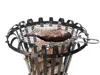 A steak is being grilled on a black metal fire pit. Produktbild-Vorschau