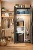 A laundry room or utility closet with shelves and a cabinet storing cleaning supplies and equipment. Anteprima dell’immagine prodotto