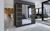 A modern living room with a large sliding door wardrobe. Náhled obrázku produktu