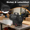 A black gas heater is placed on a metal table in what appears to be a warehouse or storage area. Produktbild-Vorschau