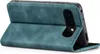 A teal flip cover case for a smartphone is shown standing upright. Produktbild-Vorschau
