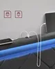Close-up of a bed frame headboard with integrated charging ports and LED lighting. Náhled obrázku produktu