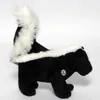 A plush toy skunk standing on a white background. Produktbild-Vorschau