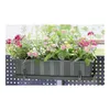 A planter box filled with colorful flowers on a balcony railing. Produktbild-Vorschau