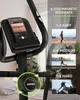 A close-up of a home elliptical trainer with a phone mounted on the console, and marketing text and images highlighting features. Podgląd zdjęcia produktu